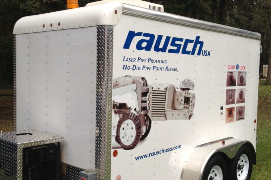 A white truck with Rausch USA on the design