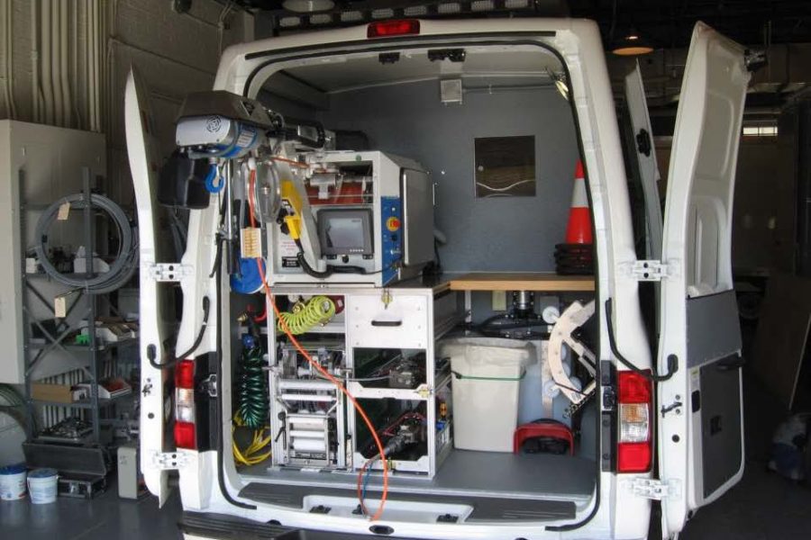 Equipment in the back of a white car